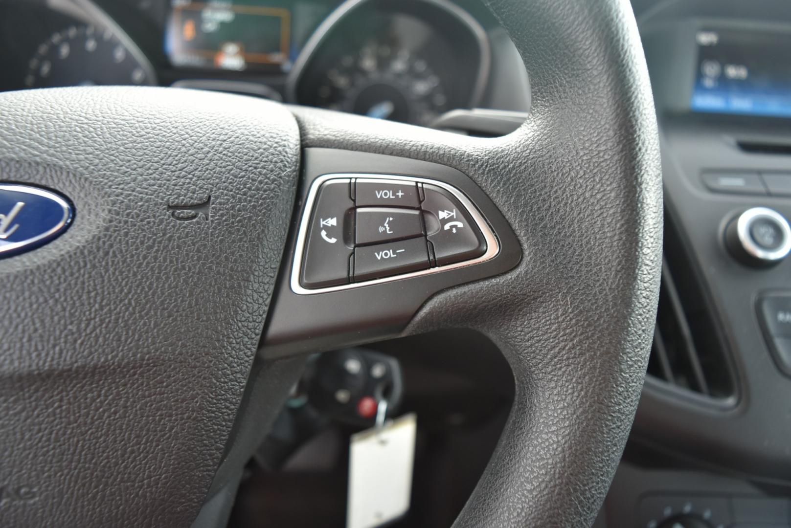 2016 Gray /Black Ford Focus SE (1FADP3F26GL) with an 2.0L I-4 GDI TI-VCT FLEX FUEL engine, 6-Speed Powershift Automatic transmission, located at 1600 E Hwy 44, Rapid City, SD, 57703, (605) 716-7878, 44.070232, -103.171410 - Photo#17